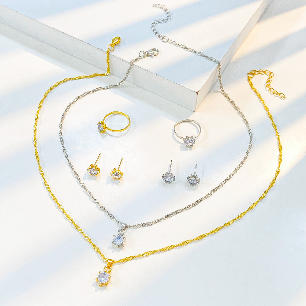 Ensemble trois pièces : collier, boucles d'oreilles et bague en oxyde de zirconium