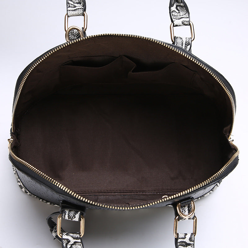 Handtasche aus Schlangenleder in Rot oder Schwarz