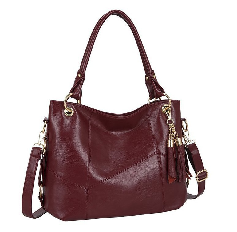 Hand Shoulder Bag with Decorative Tassels