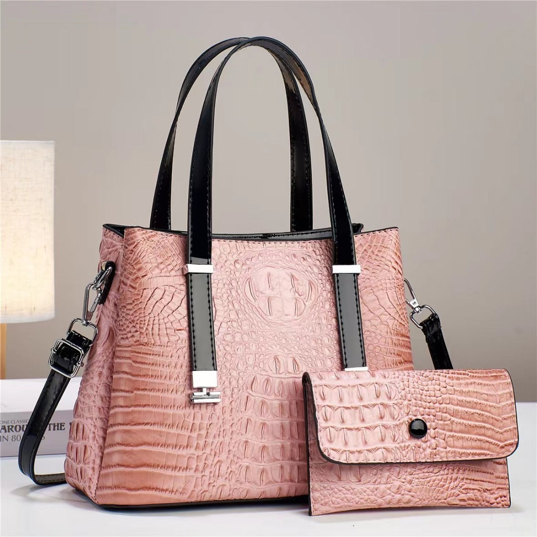 Umhängetasche mit Krokodil-Print und passendem Clutch-Set