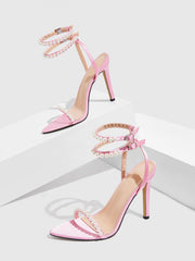 Fashionable pearl embellished high heels