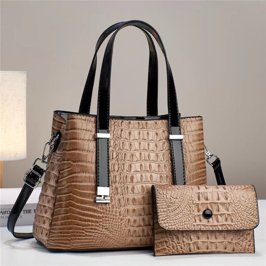 Umhängetasche mit Krokodil-Print und passendem Clutch-Set