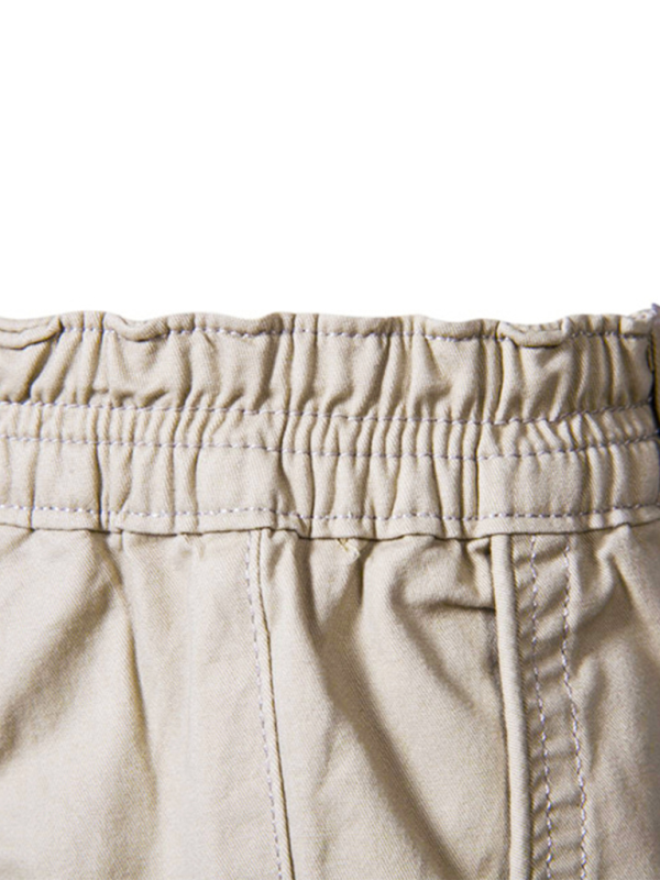 Short décontracté uni avec poches pour homme