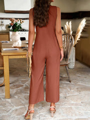 Combinaison ample sans manches à col en V et poches, disponible en 4 couleurs (S-XL)